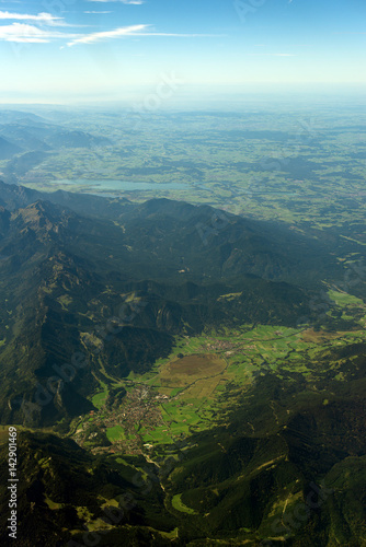 Aerial view of village in the mountains of the Alps. © M-Production