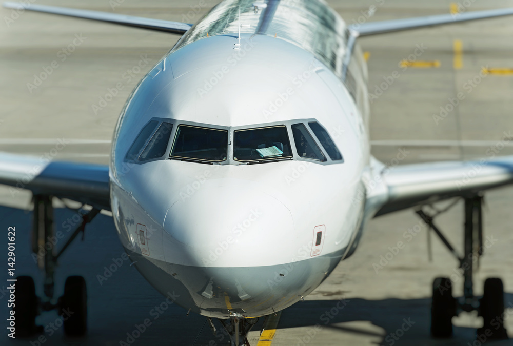 Close-up view of airplane on airfield in airport.