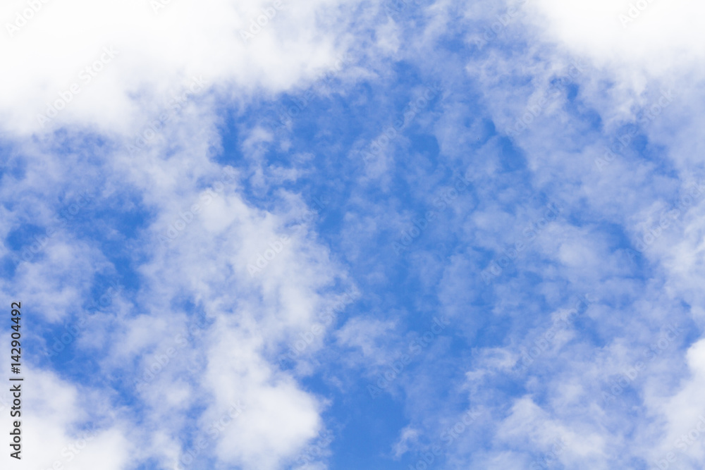 white fluffy clouds in the blue sky with sunset. white fluffy clouds in the blue sky with sunset.