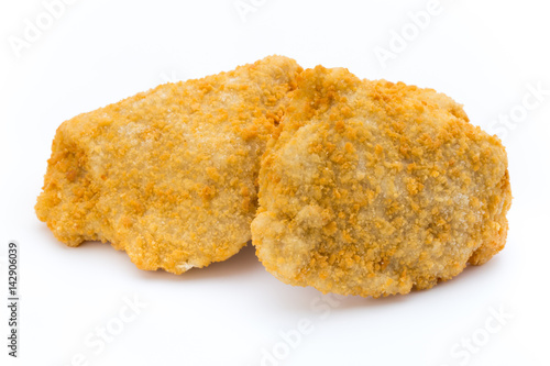 Fried chicken nuggets isolated on white.