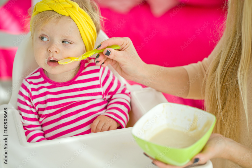 The baby eats The baby eats