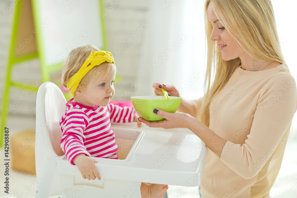 A small child eats A small child eats