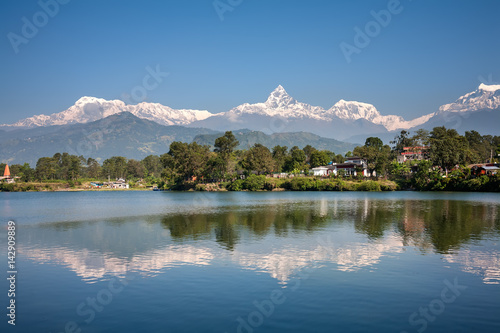 View at Annapurna mountain range and its reflection in Phewa lake in Pokhara  Nepal