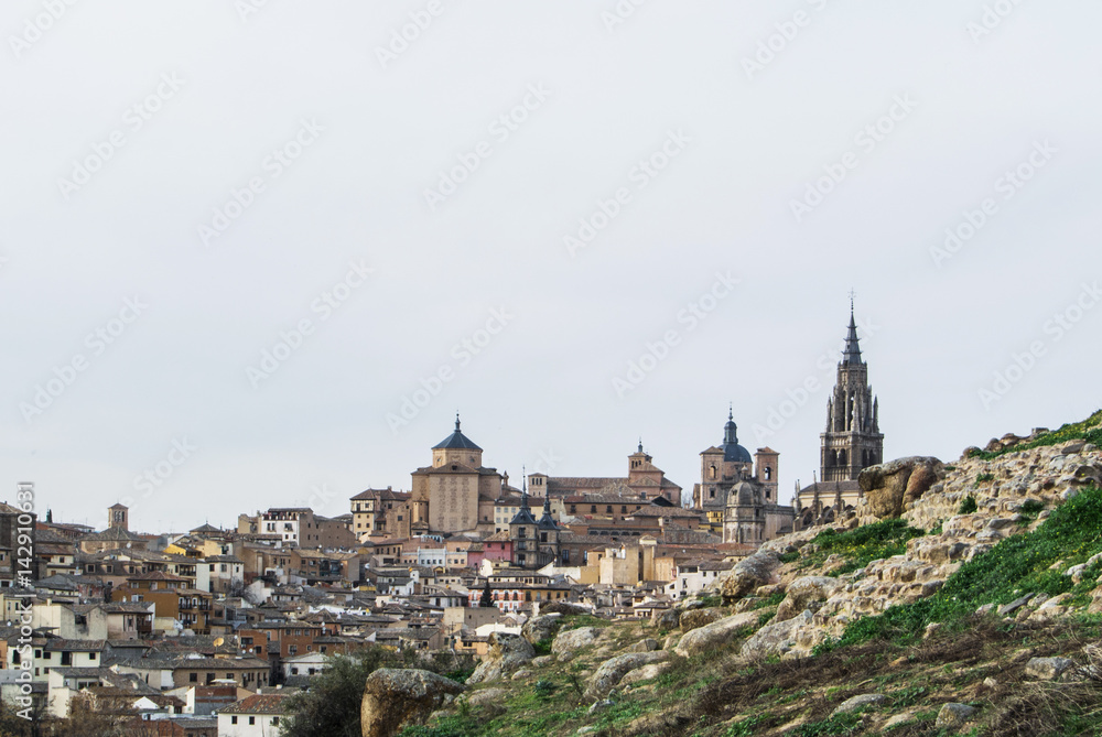 A view to Toledo old town and Cathedral from a viewpoint over the hill at surroundings of the town, Castilla La Mancha, Sapin.