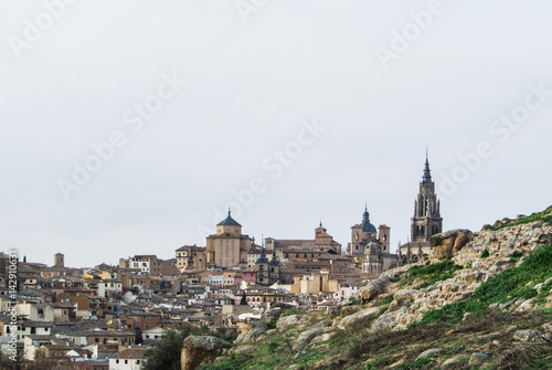A view to Toledo old town and Cathedral from a viewpoint over the hill at surroundings of the town, Castilla La Mancha, Sapin.