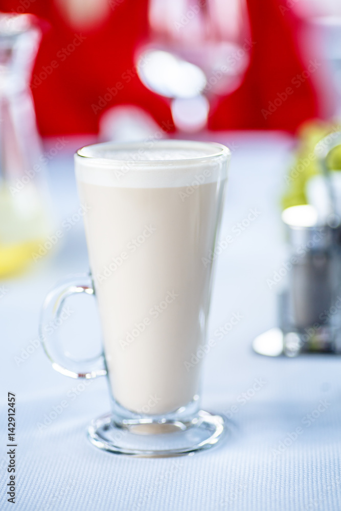 Coffee with milk, or Raw coffee in a tall glass. Coffee with milk, or Raw coffee in a tall glass.