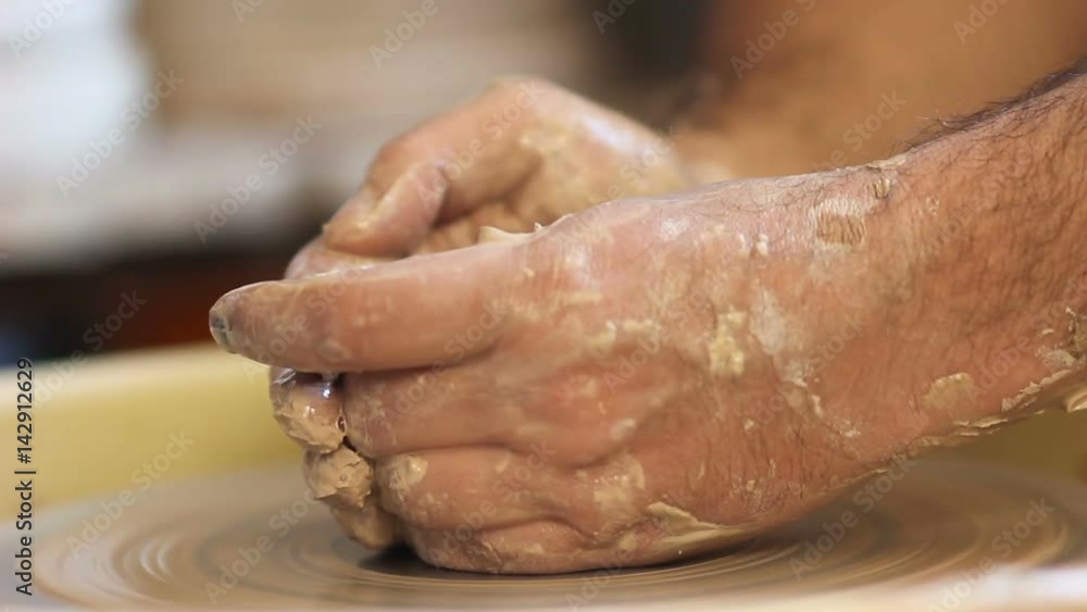 Close up of hands. Masterclass of making beautiful pottery Close up of hands. Masterclass of making beautiful pottery
