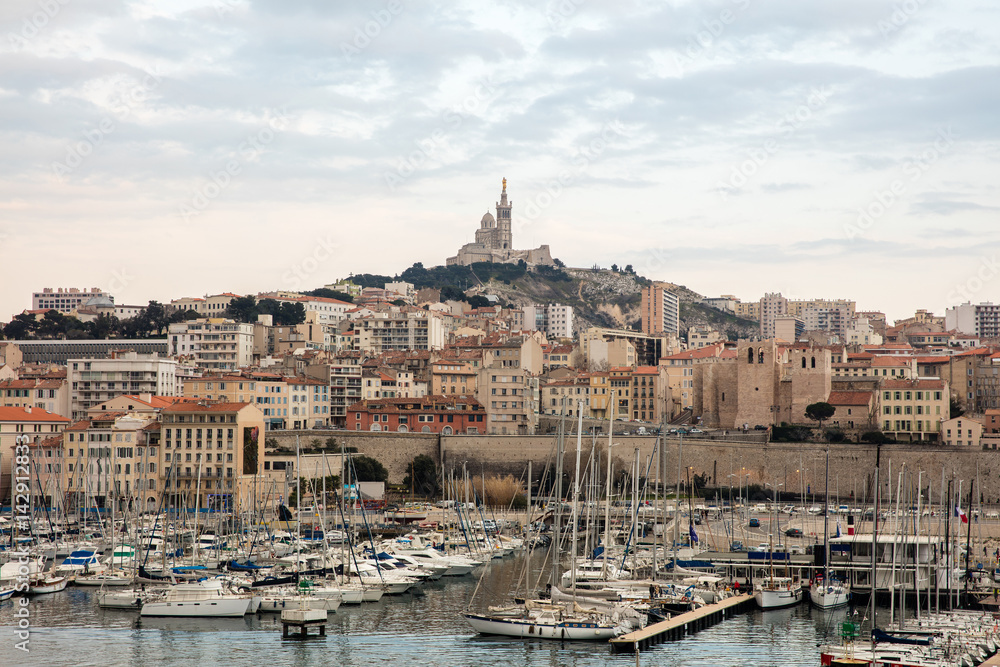 Aerial view on basilica of Notre Dame de la Garde and old port in Marseille