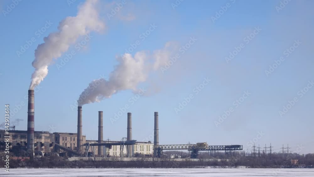From the pipes of an industrial plant cloud in sky From the pipes of an industrial plant cloud in sky