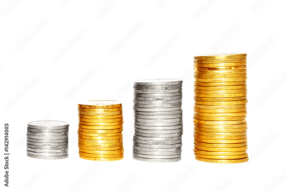 Savings, increasing columns of gold and silver coins isolated on white background Savings, increasing columns of gold and silver coins isolated on white background