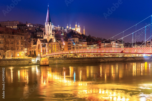 View of Saone river, Famous church in Lyon city at evening © pigprox