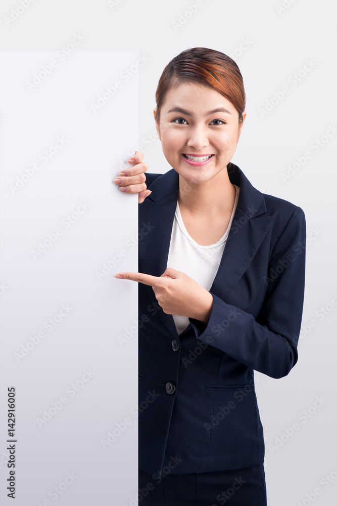 Young attractive asian woman showing a white board Young attractive asian woman showing a white board