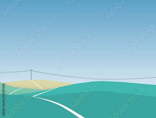 Electric pole on hill landscape