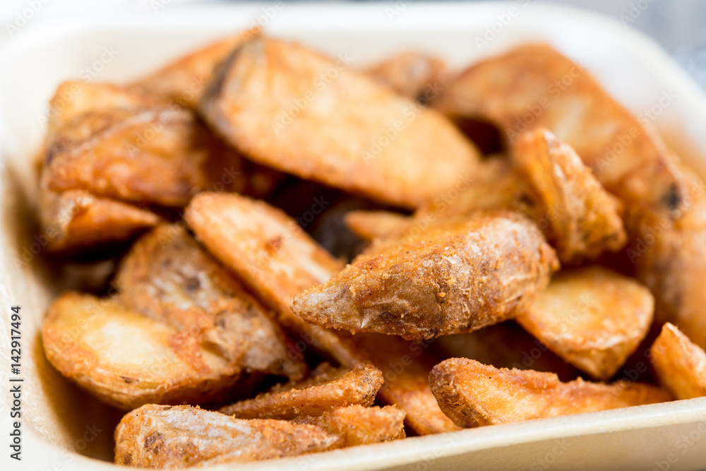 Golden French fries potatoes ready to be eaten