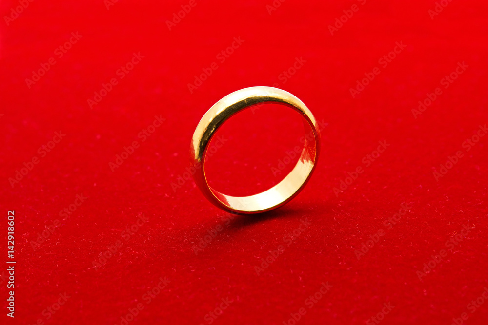 Golden Ring on Red Background Golden Ring on Red Background