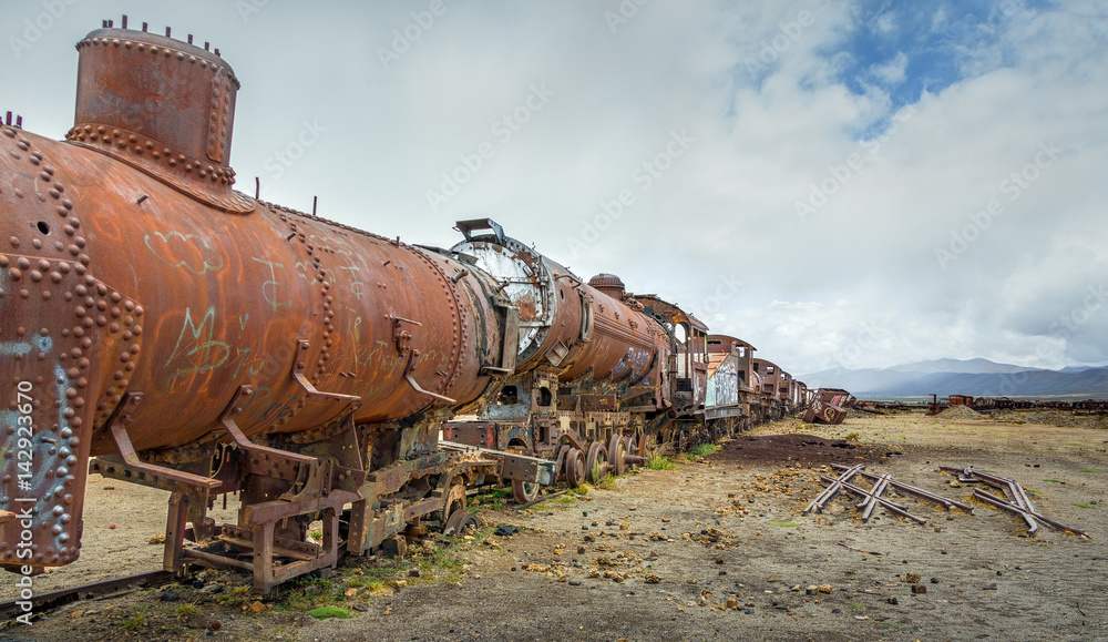 Unique antique cemetery of steam trains on the Altiplano near Uyuni - Bolivia, Latin America Unique antique cemetery of steam trains on the Altiplano near Uyuni - Bolivia, Latin America