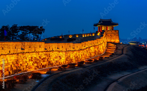 Hwaseong Fortress at night in Suwon, South Korea photo