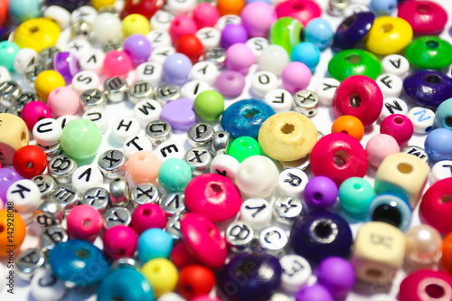 Beads Background. Retro Top View Colorful Bead Heap. child background.