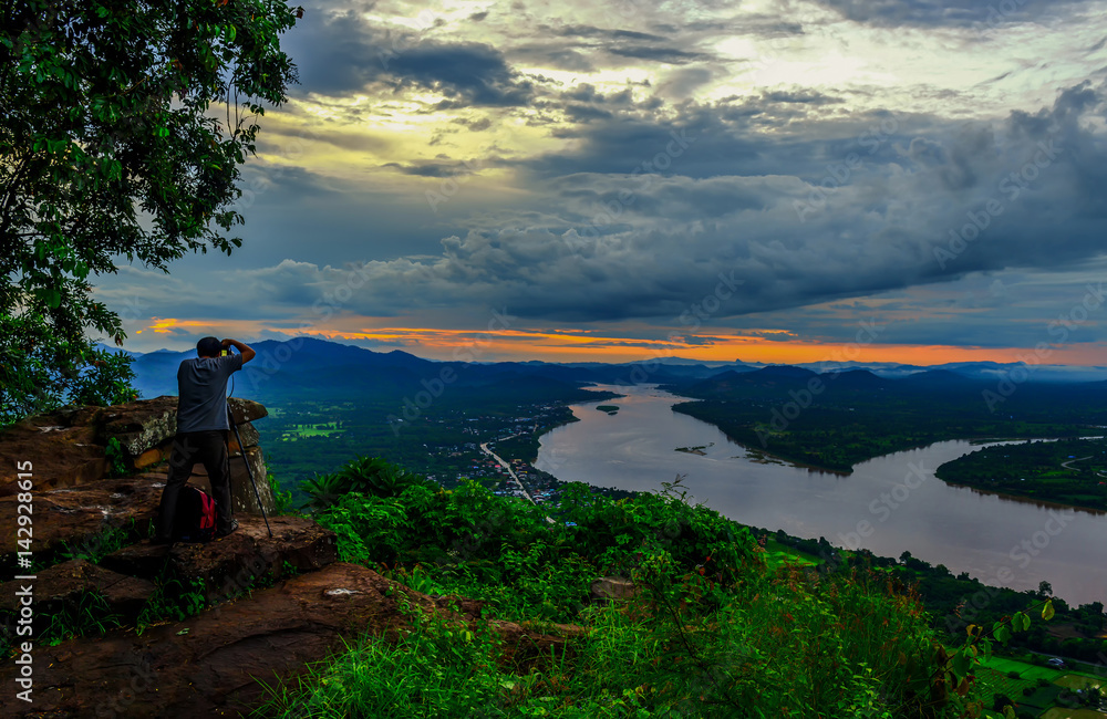 Tourists taking photos of Mekong River Landscape in nongkhai,ThaiLand
