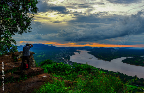 Tourists taking photos of Mekong River Landscape in nongkhai,ThaiLand
