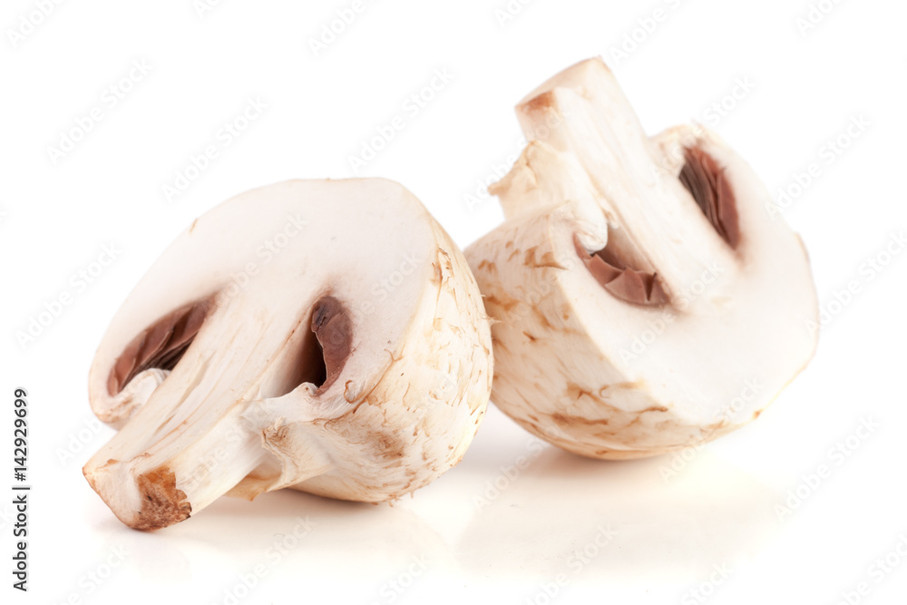 champignon mushrooms half isolated on white background champignon mushrooms half isolated on white background