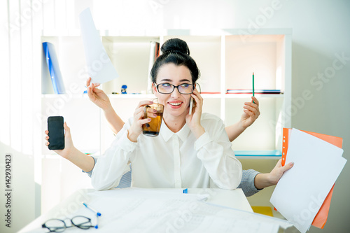 Successful businesswoman multitasking