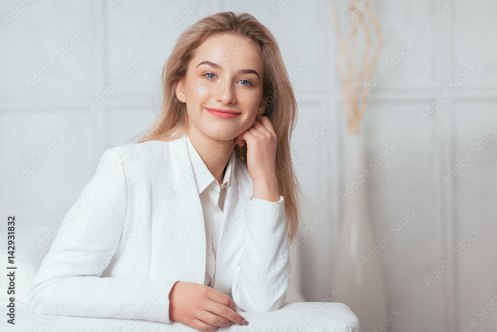 Portrait of beautiful young woman working in the office. Portrait of beautiful young woman working in the office.