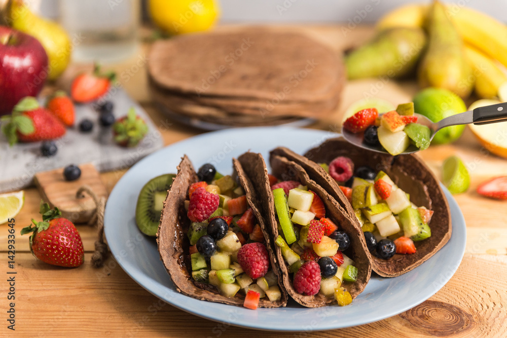 Sweet tacos with kiwi, raspberry, blueberry, strawberry and pear Sweet tacos with kiwi, raspberry, blueberry, strawberry and pear