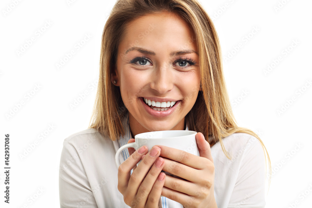 Adult woman drinking cup of tea coffee isolated over white Adult woman drinking cup of tea coffee isolated over white