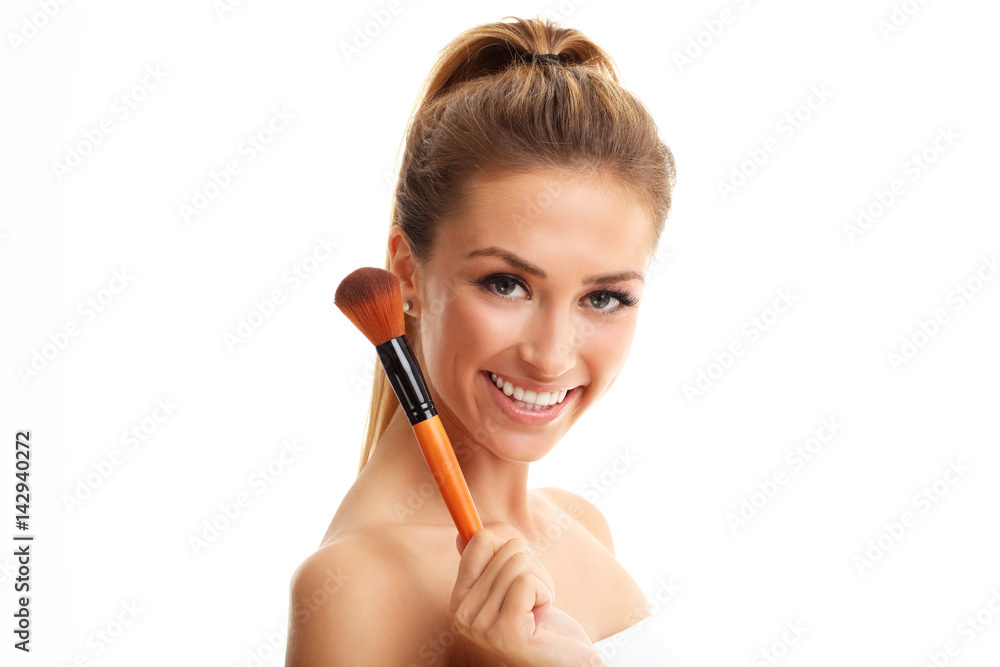 Beauty portrait of adult woman with the makeup brush isolated on white Beauty portrait of adult woman with the makeup brush isolated on white