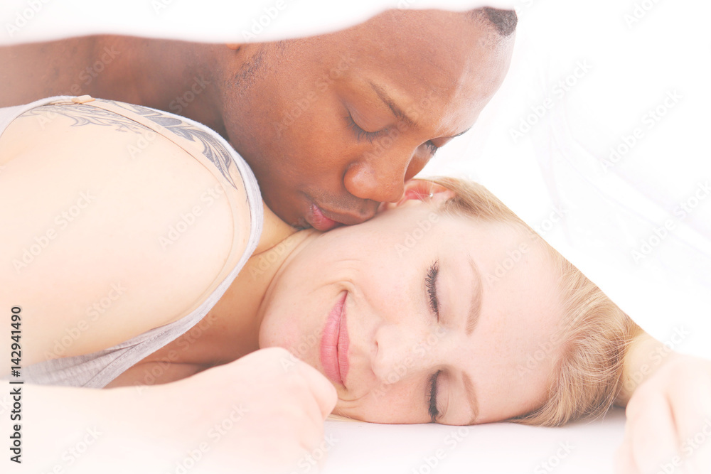 Kissing Under The Blanket - Waking up with a kiss - Man kissing sleeping woman Kissing Under The Blanket - Waking up with a kiss - Man kissing sleeping woman