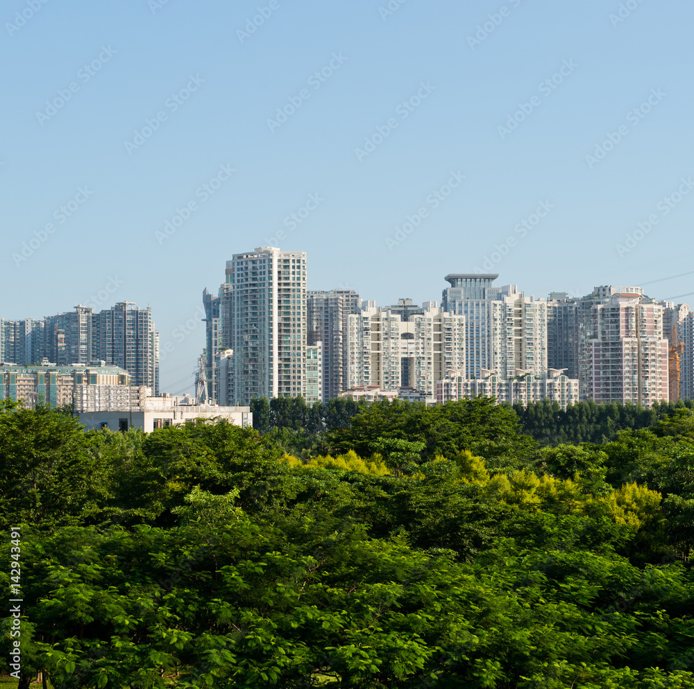 park and modern building in the city.