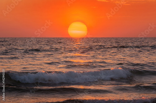 Sunrise or sunset over the sea.
