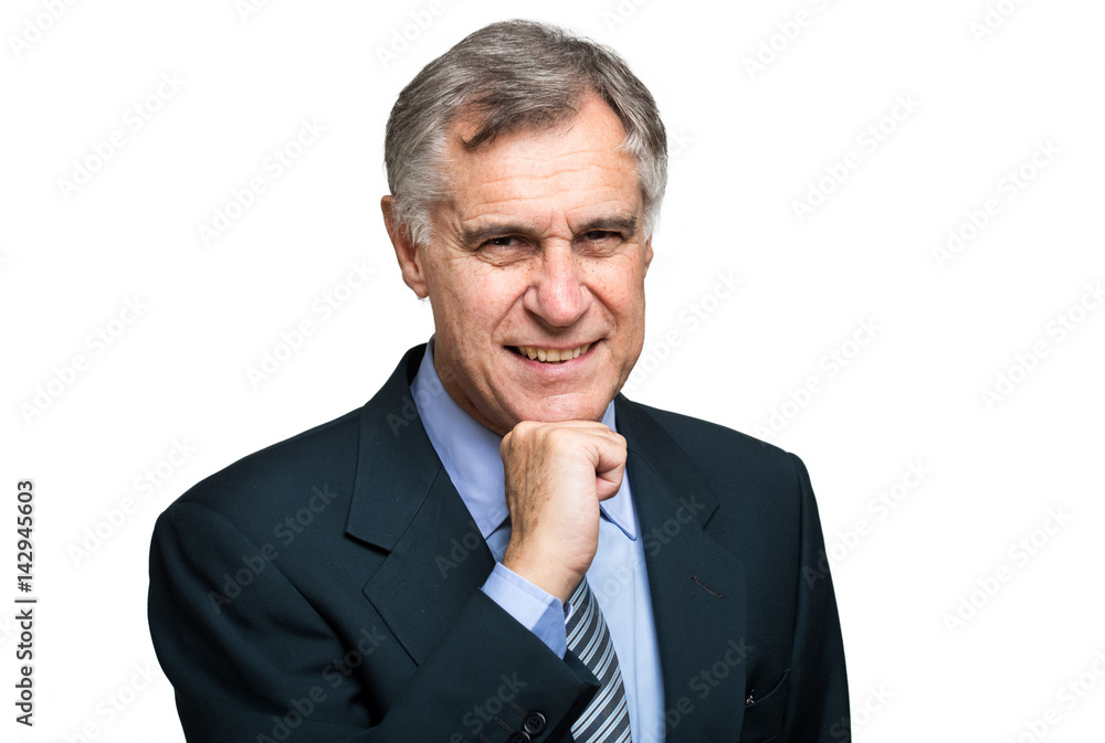 Senior businessman in his office Senior businessman in his office