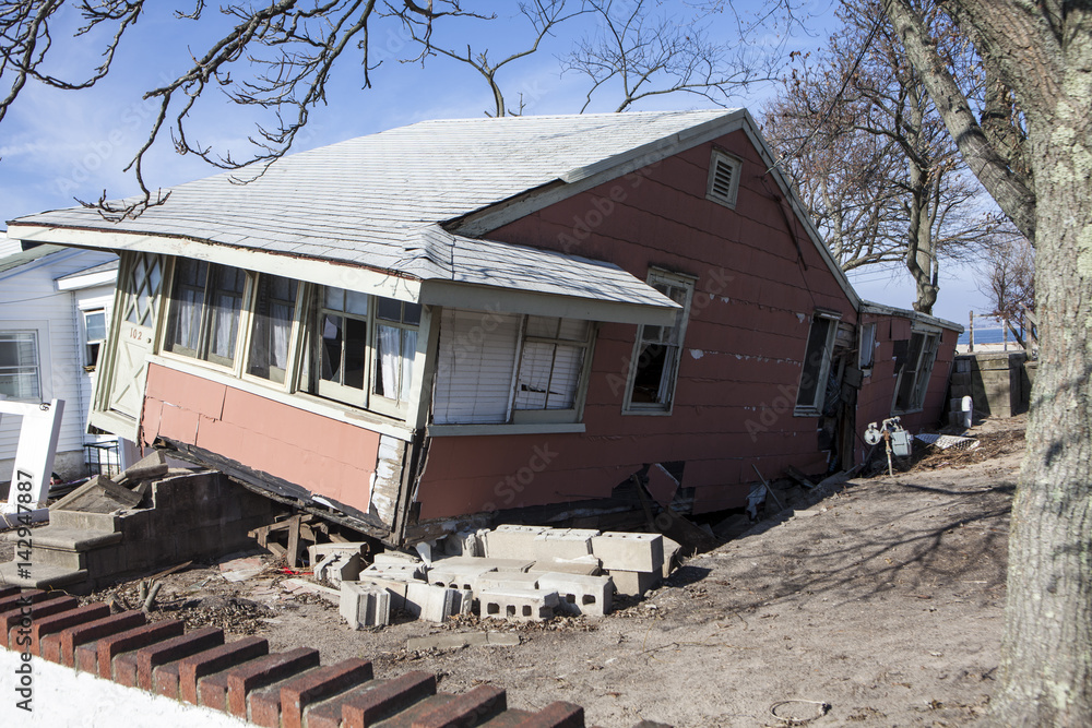 NEW YORK -November12:Destroyed homes during Hurricane Sandy in the flooded neighborhood at Breezy Point in Far Rockaway area on November12, 2012 in New York City, NY