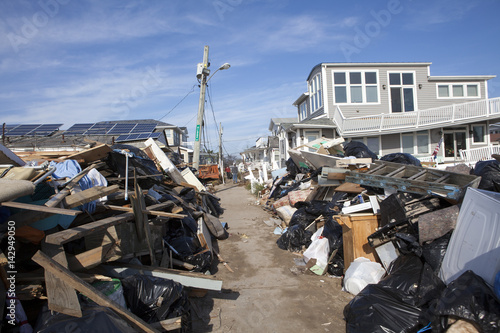Obraz na płótnie NEW YORK -November12:Destroyed homes during Hurricane Sandy in the flooded neighborhood at Breezy Point in Far Rockaway area on October 29, 2012 in New York City, NY w salonie