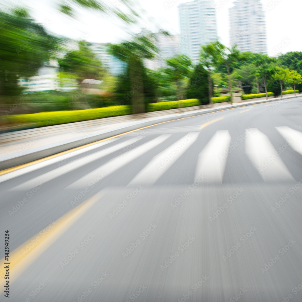 along the road with motion blur. along the road with motion blur.