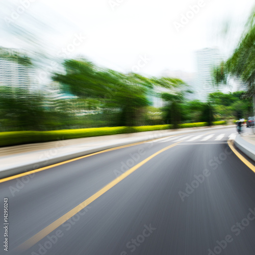 along the road with motion blur. © xy