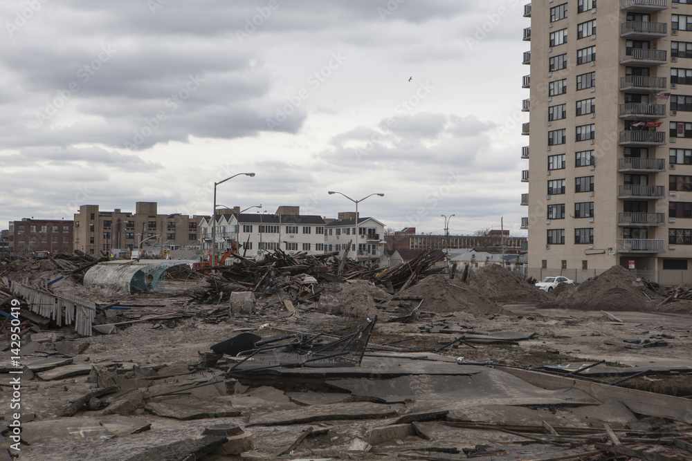 Fototapeta premium NEW YORK - November 1: Large section of the iconic boardwalk was washed away during Hurricane Sandy in Far Rockaway area October 29, 2012 in New York City, NY