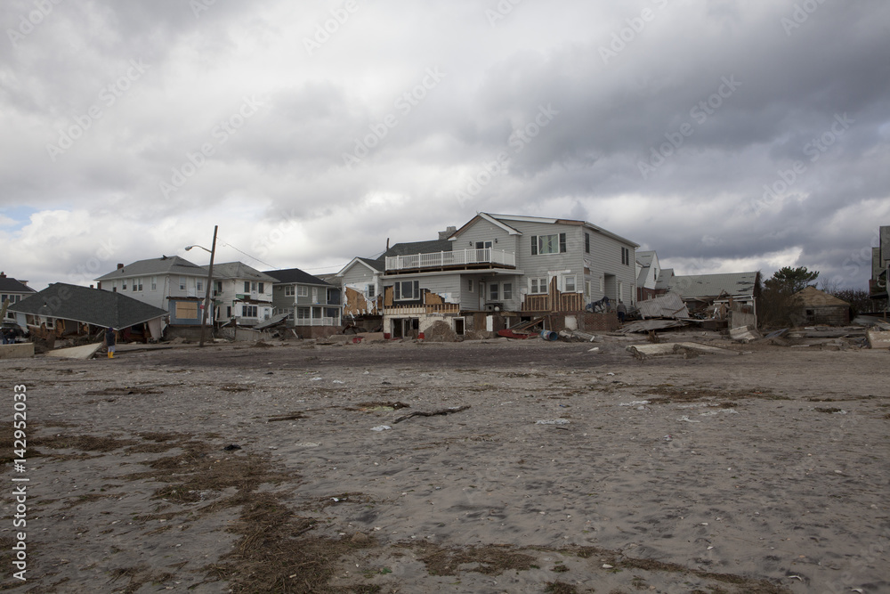 NEW YORK - October 31:Destroyed homes in Far Rockaway after Hurricane Sandy October 29, 2012 in New York City, NY NEW YORK - October 31:Destroyed homes in Far Rockaway after Hurricane Sandy October 29, 2012 in New York City, NY