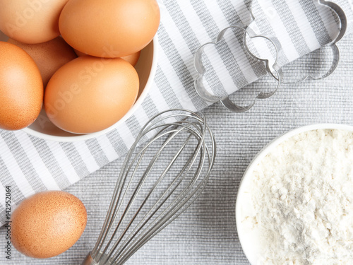 Chicken rind eggs, flour, ingredients and props shape and corolla for cooking homemade baking flat lay