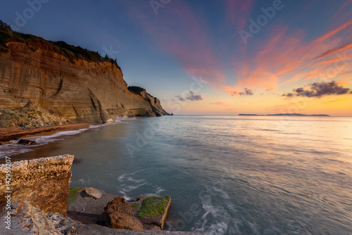 Logas the Sunset Beach and amazing rocky cliff in Peroulades. Corfu Island. Greece.