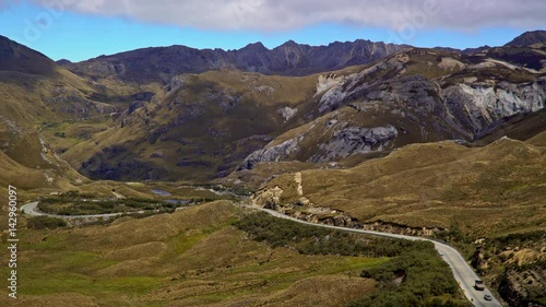 Time lapse of Cars and trucks traveling through the Cajas National Park near Cuenca Ecuador. Sept 9th 2016 photo