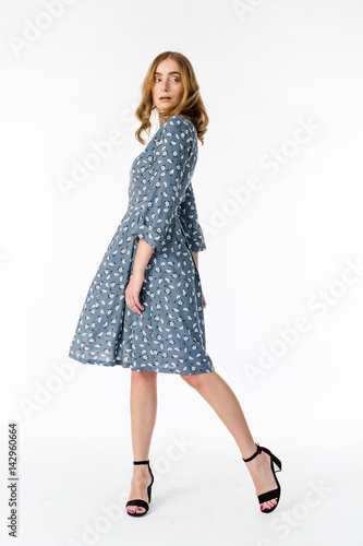 Wallpaper Mural Young elegant female in light summer dress, over white background Torontodigital.ca