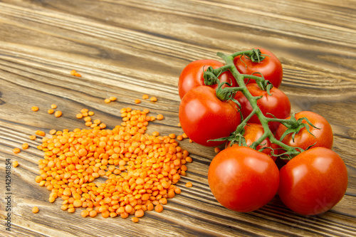 red lentil beans healthy diet food bunch of small cherry tomatoes fresh vegetables