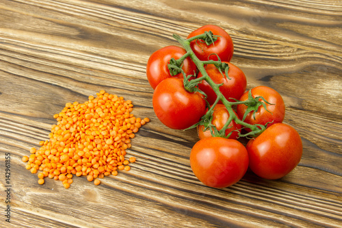 red lentil beans healthy diet food bunch of small cherry tomatoes fresh vegetables
