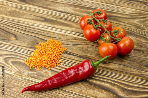 red lentil beans healthy diet food bunch of small cherry tomatoes red sweet pepper fresh vegetables