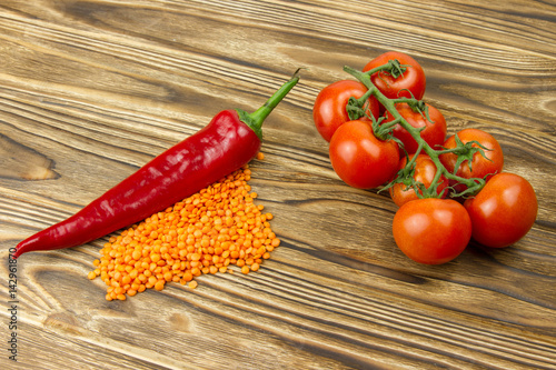 red lentil beans healthy diet food bunch of small cherry tomatoes red sweet pepper fresh vegetables
