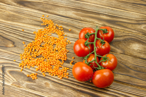 red lentil beans healthy diet food bunch of small cherry tomatoes fresh vegetables