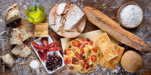 Focaccia with cherry tomatoes and olives, bread, white focaccia, dried tomatoes and olives